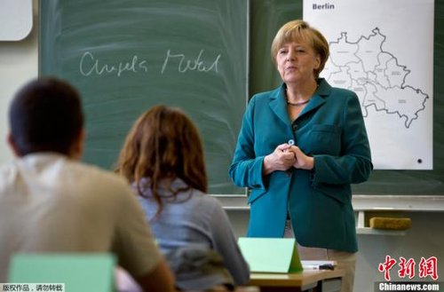德国大选联盟党赢多数选票 默克尔连任总理